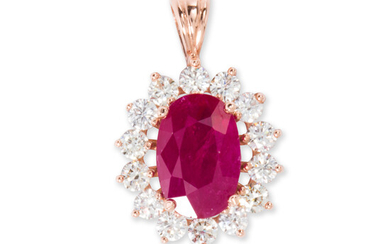 A ruby, diamond and fourteen karat gold pendant