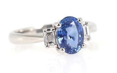 A sapphire and diamond ring set with a sapphire weighing app. 1.85...