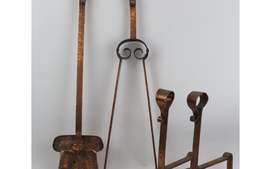 A set of Arts and Crafts fireplace implements, late 19th cen...