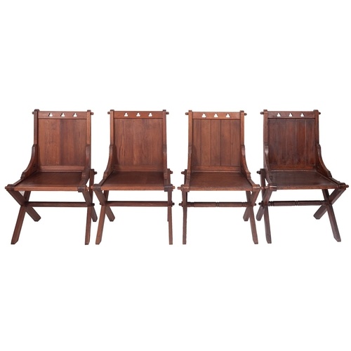 A set of four Victorian pitch pine Glastonbury chairs, late ...