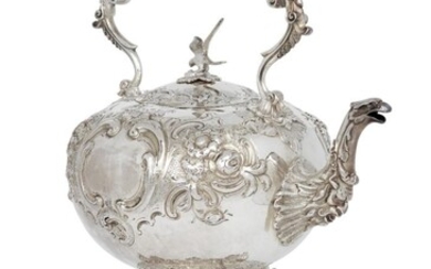 A silver hot water kettle with stand and burner, London, 1859, Robert Harper, the round kettle designed with repousse floral scroll body, zoomorphic spout and bird finial to lid, the fixed handle with ivory spacers, 26cm high (exc. stand), 38.5cm...