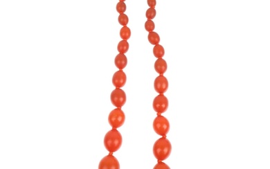 A single-strand graduated amber? bead necklace, beads measur...