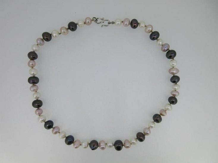 A three coloured cultured pearl necklace