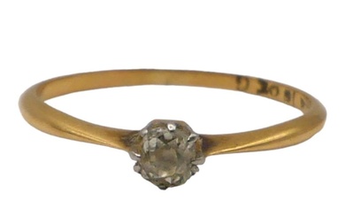 AN 18CT GOLD DIAMOND SOLITAIRE RING Having old European...