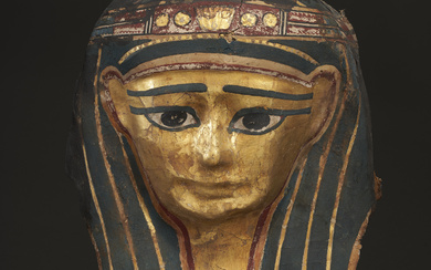AN EGYPTIAN GILT CARTONNAGE MUMMY MASK LATE PTOLEMAIC TO EARL...