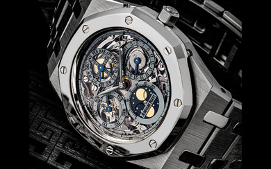 AUDEMARS PIGUET. AN EXTREMELY RARE PLATINUM AND STAINLESS STEEL LIMITED EDITION AUTOMATIC SKELETONISED PERPETUAL CALENDAR WRISTWATCH WITH LEAP YEAR INDICATOR, MOON PHASES AND BRACELET, MADE TO CELEBRATE THE 25TH ANNIVERSARY OF ROYAL OAK ROYAL OAK...