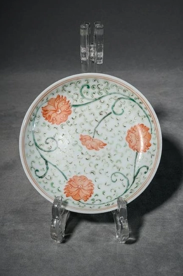 Alum red and green colored dish with twining lotus patterns