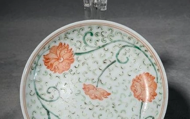 Alum red and green colored dish with twining lotus patterns