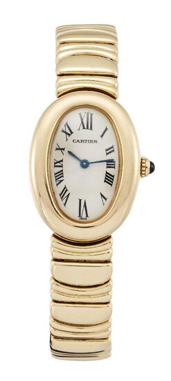 An 18ct gold 'baignoire' quartz wristwatch by Cartier, the oval dial with Roman numerals to a fancy link bracelet with double deployant clasp, dial, case and clasp signed Cartier, case numbered 1954 884759CD, case and clasp with European Convention...