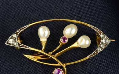 An Art Nouveau gold ruby, pearl and rose-cut diamond brooch.