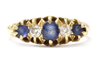 An Edwardian 18ct gold sapphire and diamond five stone ring