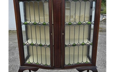 An Edwardian Mahogany and inlaid display Cabinet with glazed...