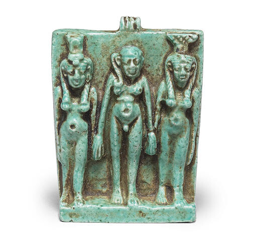 An Egyptian turquoise faience triad plaque
