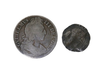 An Elizabeth I 1602 sixpence coin, heavily worn, bust oblite...