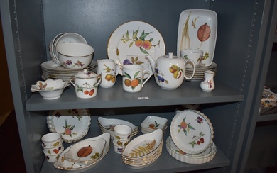 An assorted collection of Royal Worcester Evesham patterned tableware, including flan dishes