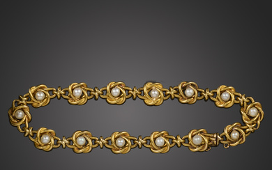 An early 20th century French pearl and gold bracelet