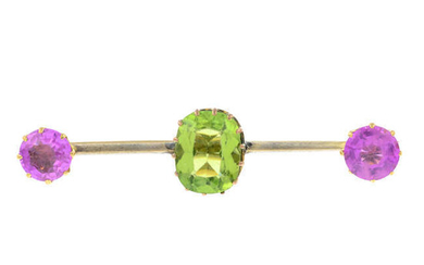 An early 20th century gold, peridot and synthetic pink sapphire bar brooch.
