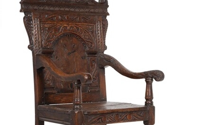 An oak wainscot armchair