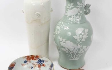 Antique Chinese ceramics, including a large 17th/18th century Dehua blanc de chine cylindrical vase with moulded masks and roundels, 40.5cm height, a 19th century celadon ground vase, an 18th centu...