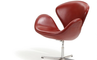 Arne Jacobsen: “The Swan”. Easy chair with height adjustable profiled aluminum swivel foot, seat and back with redbrown leather. Model 3320.