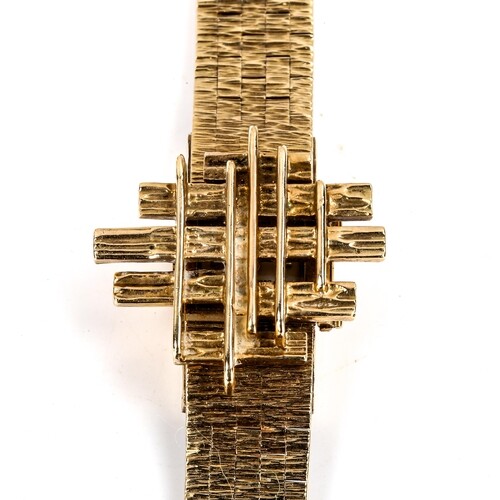 BUECHE GIROD - a lady's Vintage 9ct gold mechanical bracelet...