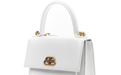 SOLD. Balenciaga: A "Shatp" bag of white leather with gold tone hardware, short handle and shoulder strap. – Bruun Rasmussen Auctioneers of Fine Art