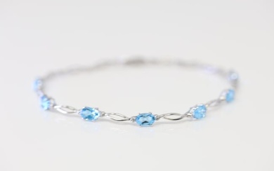 Blue Topaz & Diamond Bracelet 10Kt.
