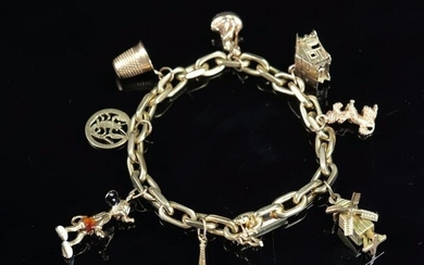 Bracelet and pendants in 18k yellow gold (32.79gr)