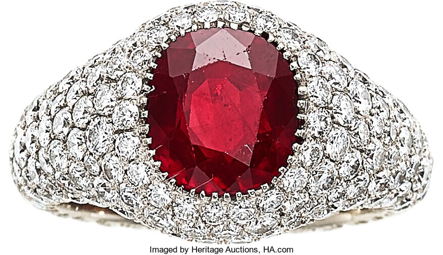 Burma Ruby, Diamond, White Gold Ring The ring features...