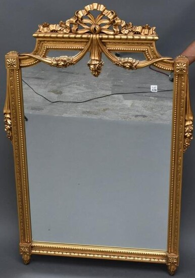 Carved Giltwood Mirror with carved bow and tassel