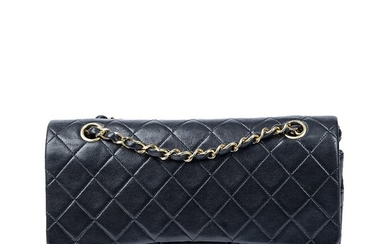 Chanel A“ Classic Double Flap” bag of black quilted leather with gold...