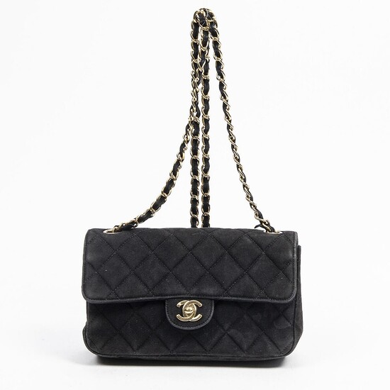 NOT SOLD. Chanel: A "Mini Rectangular Flap Bag" of black quilted suede with gold tone hardware, chain strap and one exterior back pocket. – Bruun Rasmussen Auctioneers of Fine Art