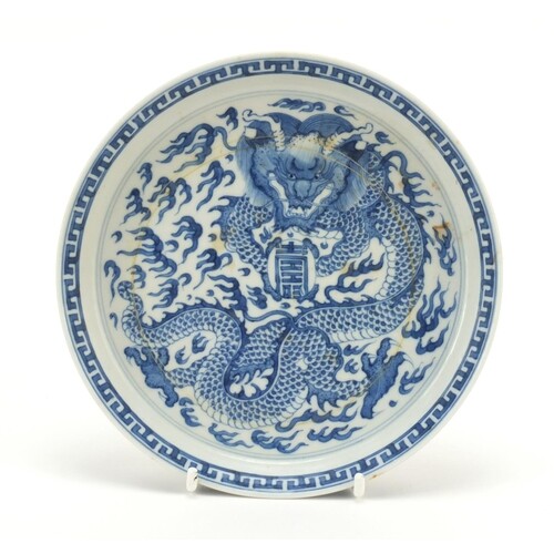 Chinese blue and white porcelain dish hand painted with a dr...