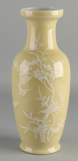 Chinese porcelain vase with ocher-yellow glaze, white