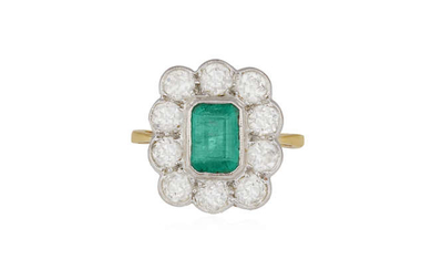 Description AN EMERALD AND DIAMOND CLUSTER RING, the cut-cornered...