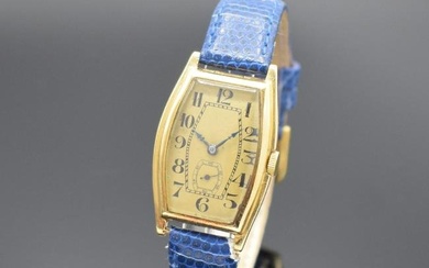 Early tonneau-shaped 18k yellow gold wristwatch