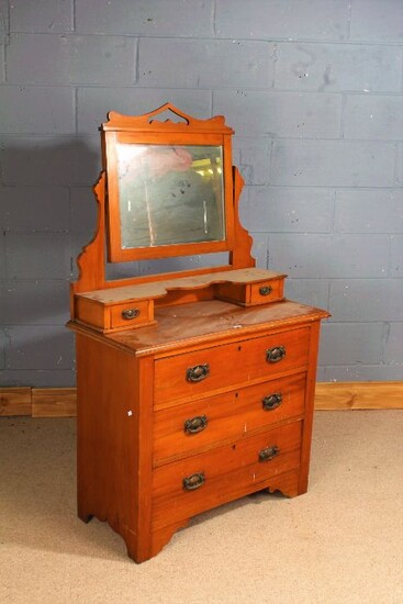 Edwardian satin walnut dressing chest, having swing mirror above three long drawers, 91cm wide