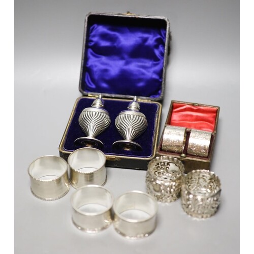Four pairs of silver napkin rings including cased Victorian ...
