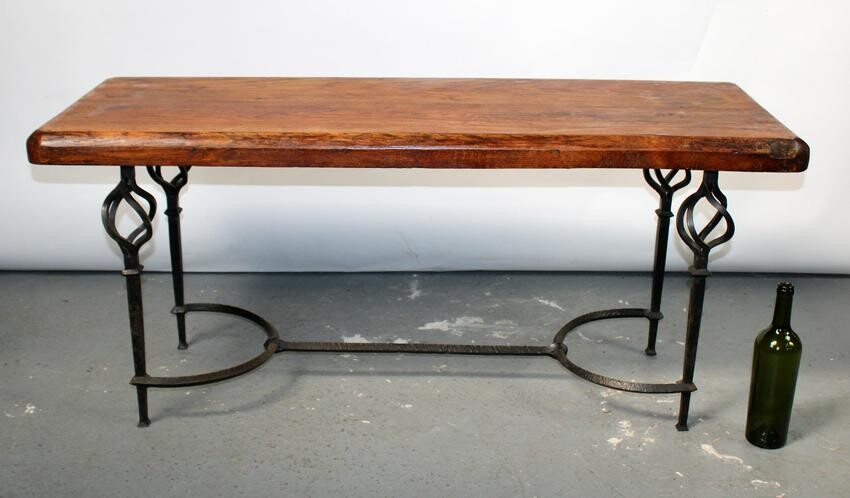 French forged iron base coffee table with oak top