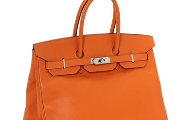 Hermès: A “Birkin 35” made of orange Epsom leather, two short handles, silver toned hardware and one compartment with two pockets.