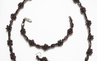 Jewelry set with garnet set consisting of necklace (length about...