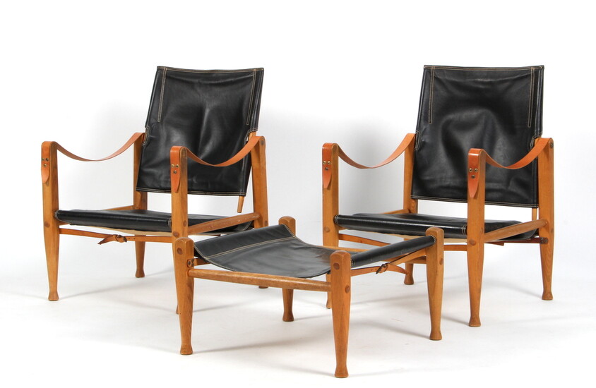 Kaare Klint A pair of safari chairs with an accompanying footstool. (3)