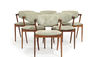 Kai Kristiansen: A set of six rosewood armchairs, seat and tilt back with greenish alcantara. Manufactured by Schou Andersen. (6)
