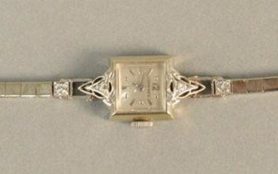 Longines 14K white gold ladies wristwatch set with four