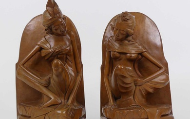 Lot details A pair of Asian carved hardwood figural bookends,...