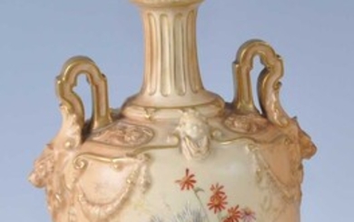 An Edwardian Royal Worcester porcelain blush ivory twin handled pedestal vase and cover