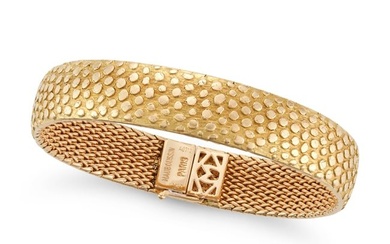 MAUBOUSSIN, A GOLD BRACELET in 18ct yellow gold, with a textured scale design, signed Mauboussin ...