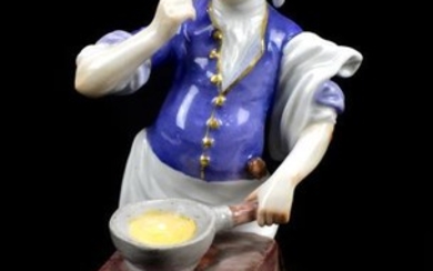 MEISSEN; a 19th century figure of a street cook...