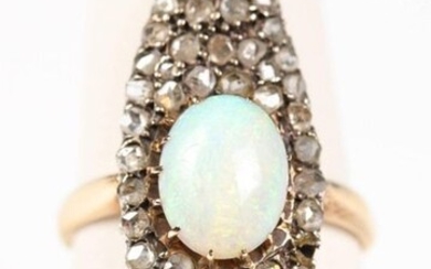 Marquise ring in yellow gold (750) centered by an opal cabochon in a rose surround. T: 60, Gross weight: 6.23 gr.
