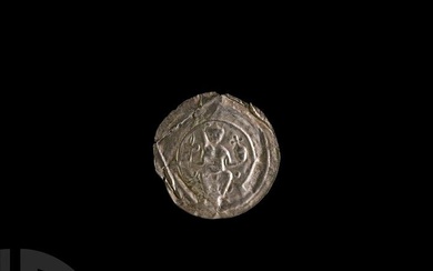 Medieval Silver Bracteate with Seated Figure